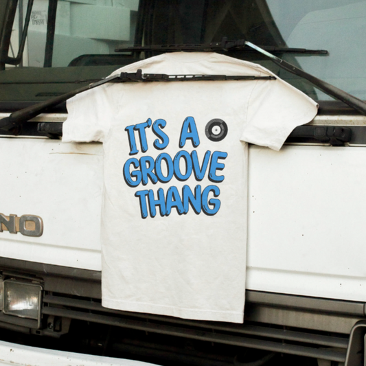 Ewan McVicar inspired white tshirt with graphic logo reading it's a groove thing with a vinyl record